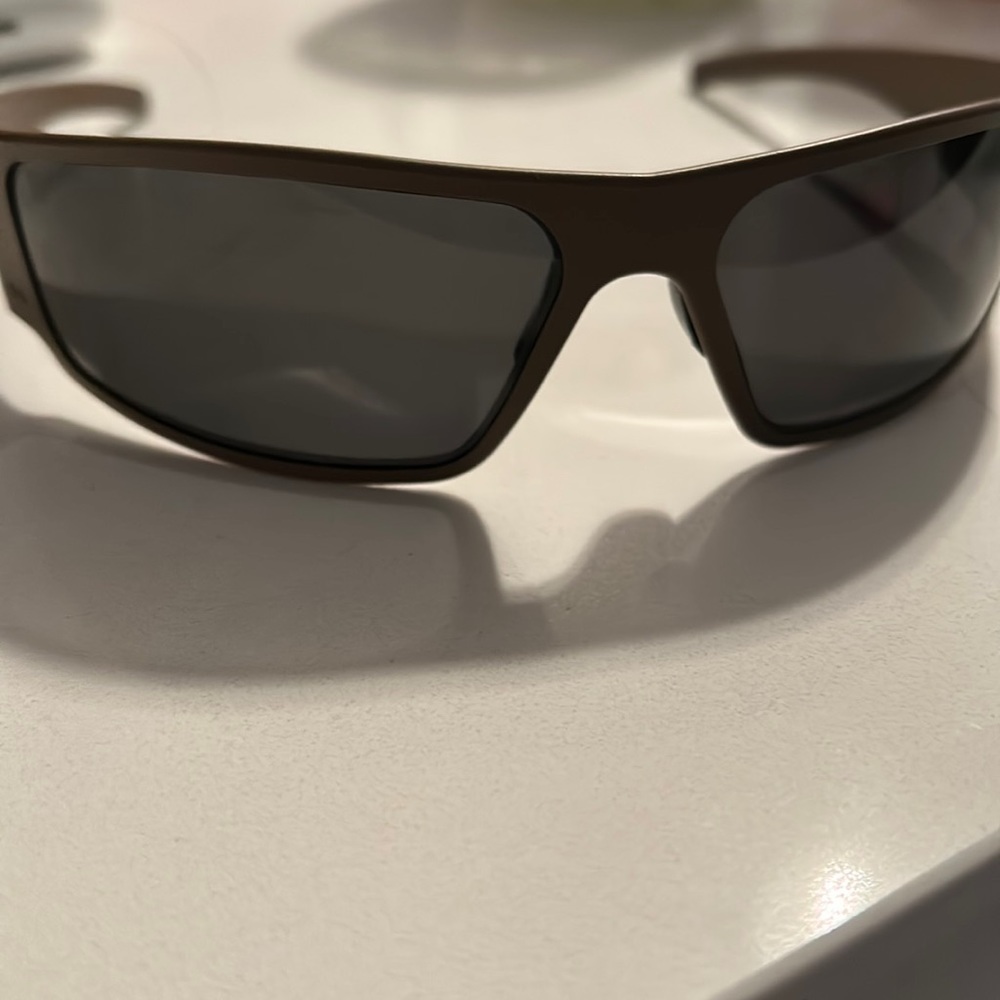 MAGNUM TACTICAL SUNGLASSES. NOTE COLOR SILVER.  Soft case included.